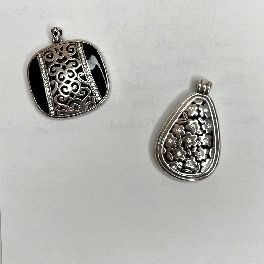 2 Different Brighton Women's Silver Reversible Pendants.